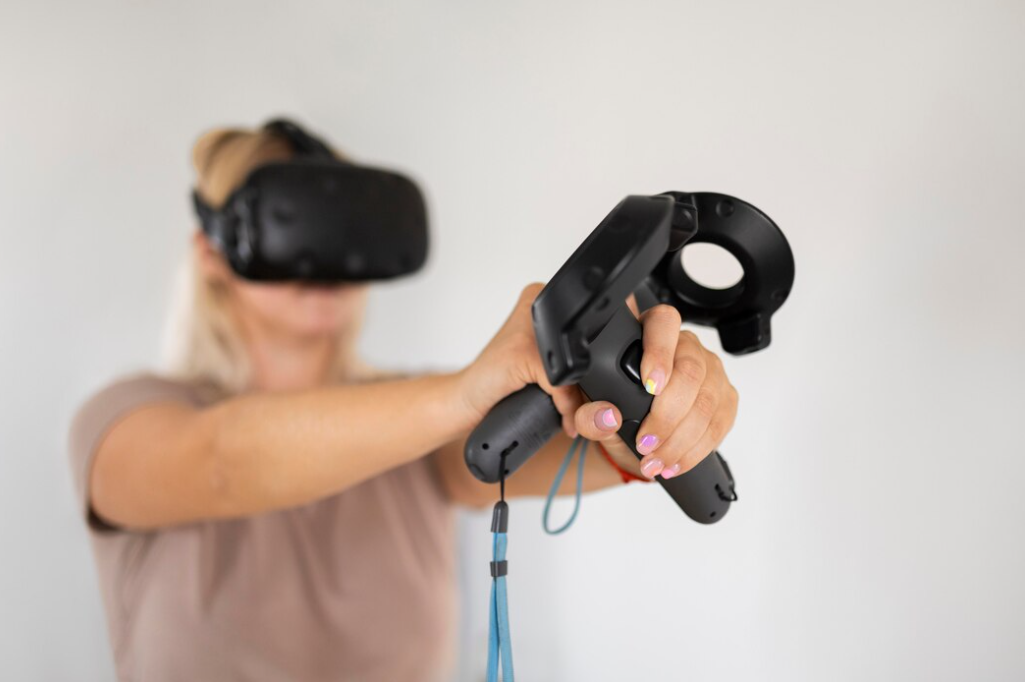 Person using a VR headset and holding motion controllers